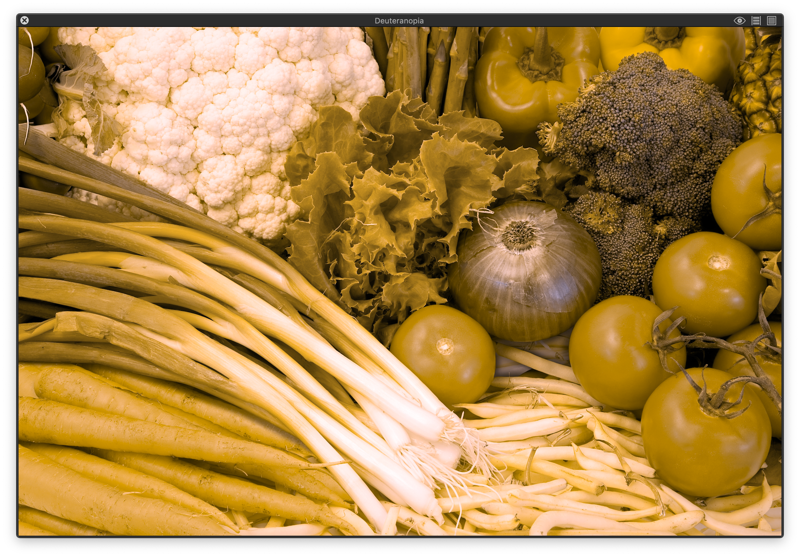 Ассорти овощей, включая помидоры, перец, брокколи и фасоль, отображённое с учётом протаномального восприятия