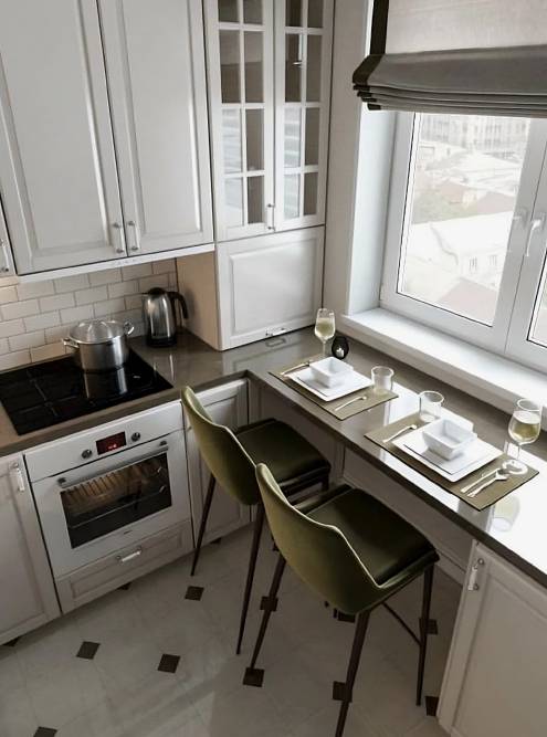 Здесь планировалось, что стол станет дополнительной рабочей поверхностью, но, чтобы ею пользоваться, придется убирать стулья. Источник: designer_vera_ganeeva / ivd.ru