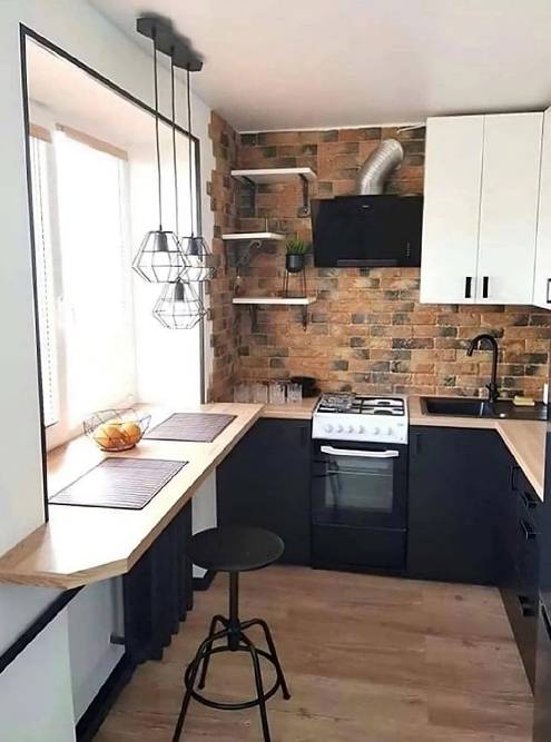 Чтобы воплотить лофт в маленькой кухне, сочетайте черные и деревянные поверхности, добавьте кирпич. Источник: Заметки продажника / «Яндекс-дзен»