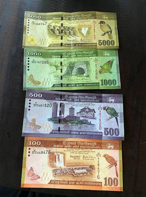 Это шри-ланкийские рупии. 5000 LKR — самая крупная купюра