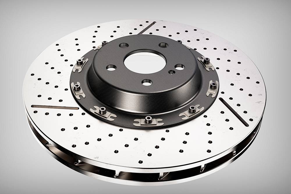 Сборный вентилируемый тормозной диск с перфорацией и насечками — более эффективное торможение, но высокая цена и меньший ресурс. Источник: Evgeniy Marin / Shutterstock