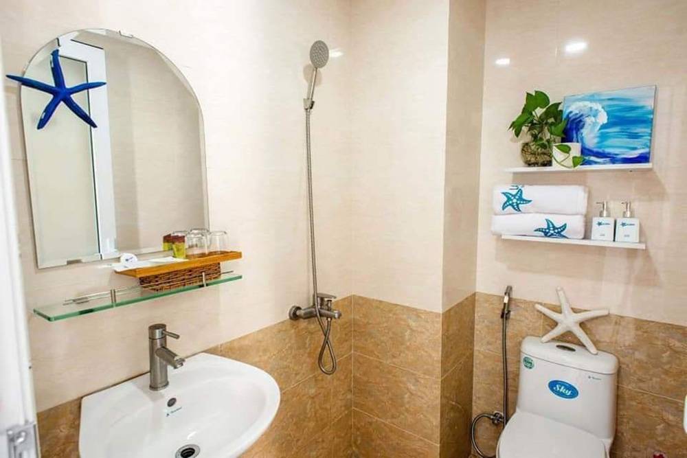 Такой душ во Вьетнаме встречается во многих отелях и квартирах