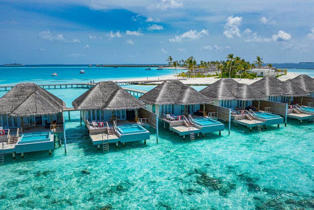 Такие виллы — один из самых популярных видов Мальдив. Источник:&nbsp;icemanphotos / Shutterstock