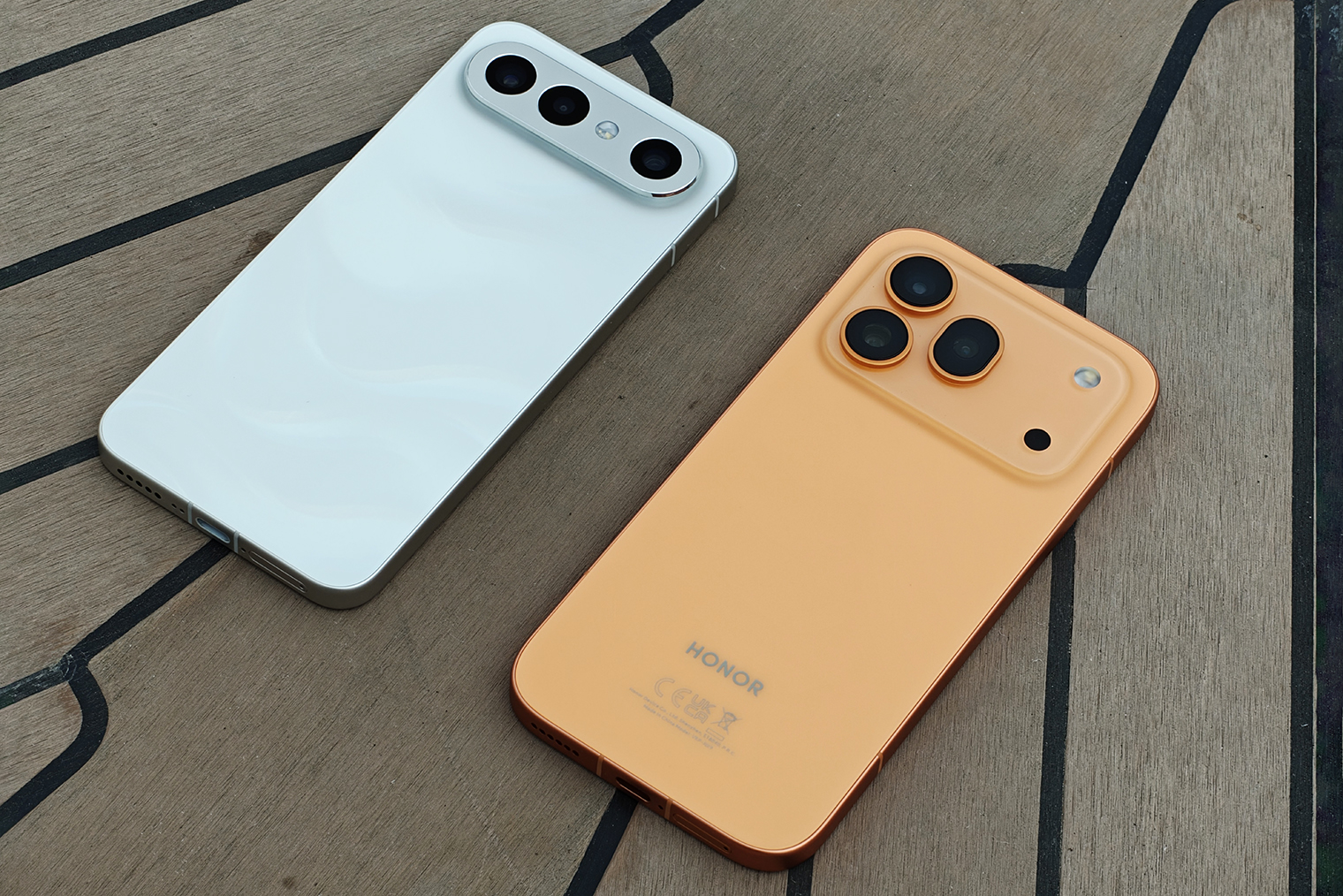 Honor 600 Pro в оранжевом цвете подражает дизайну iPhone 17 Pro. Vivo заимствует плато камеры у Pixel 10, но выглядит это не так вызывающе
