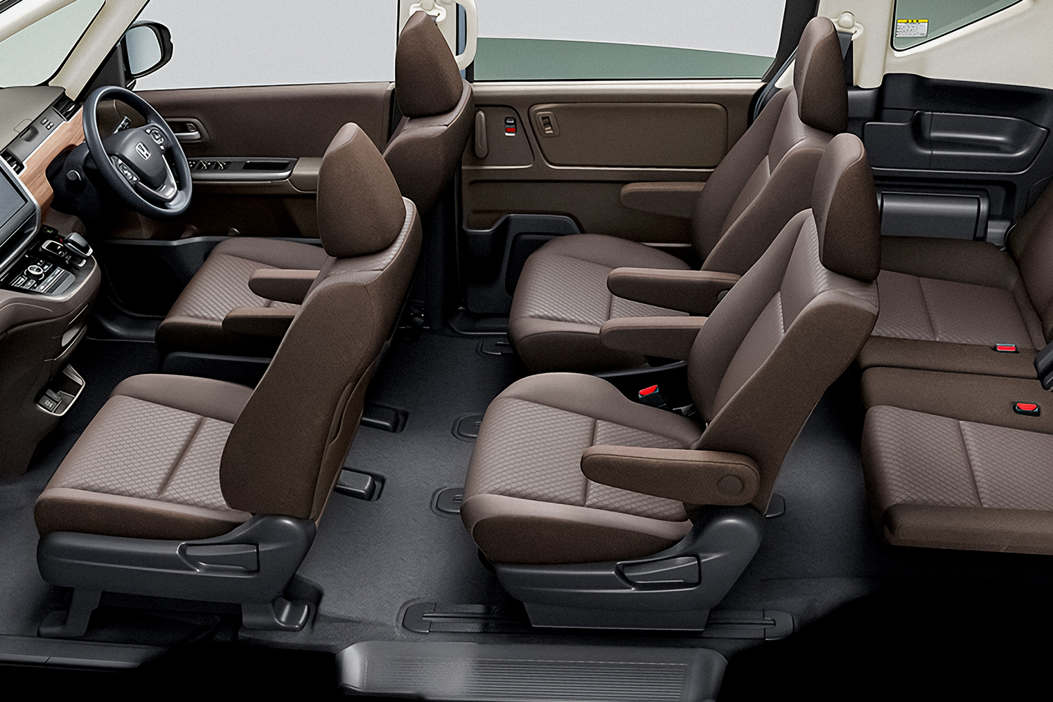 В среднем ряду вместо дивана стоят два кресла с проходом между ними. Изображение: Honda