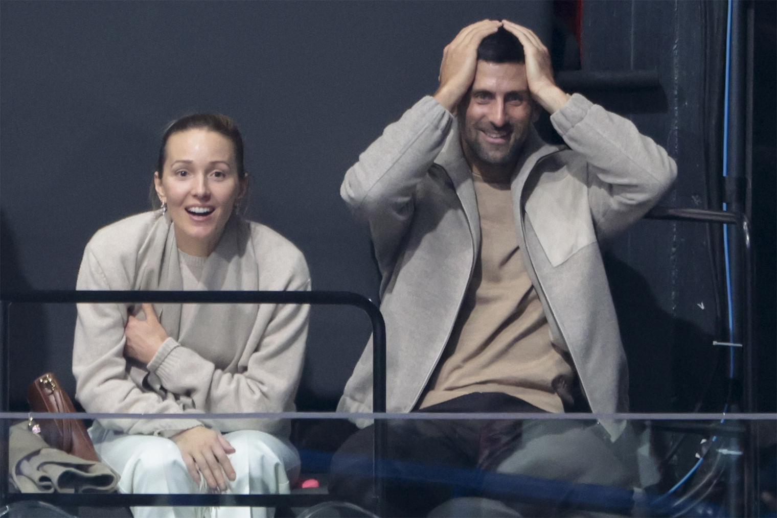 Реакция теннисиста Новака Джоковича и его жены Елены на трибунах. © Jean Catuffe / Getty Images