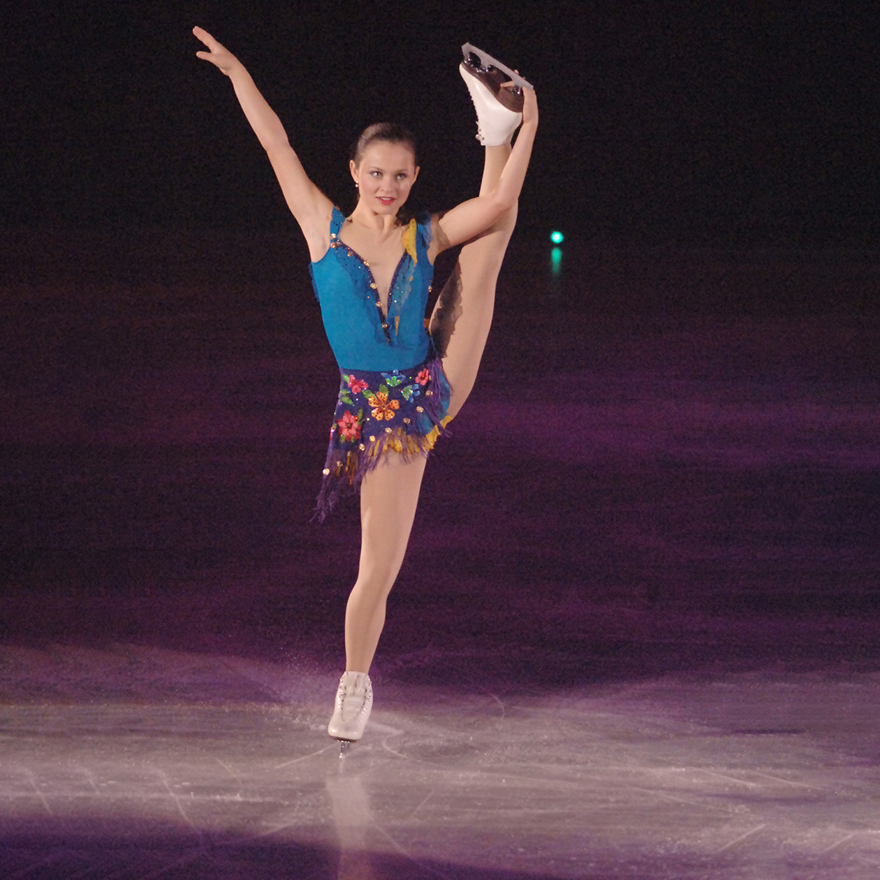 Флажок в исполнении Саши Коэн в 2006 году. Фотография: Jun Sato / WireImage / Getty Images