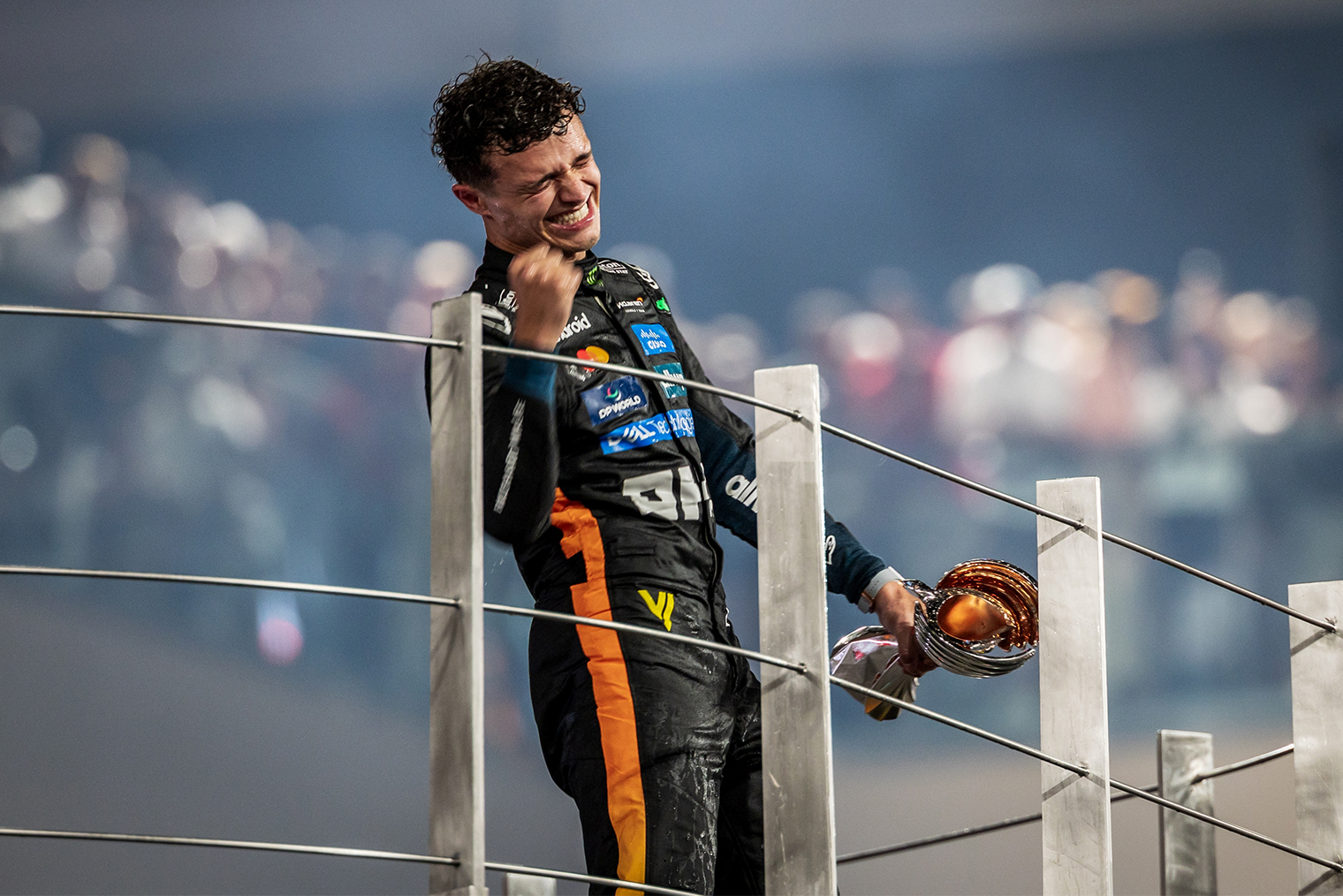 Ландо Норрис празднует чемпионство в Абу-Даби. © Jay Hirano / Shutterstock / FOTODOM