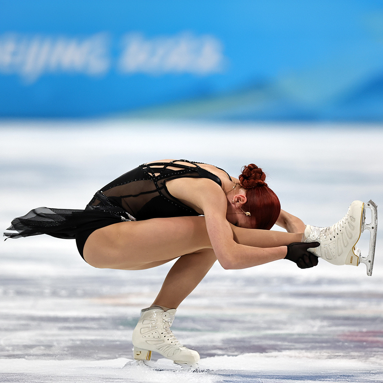 Складка в исполнении Александры Трусовой в 2022 году. Фоттография: Amin Mohammad Jamali / Getty Images