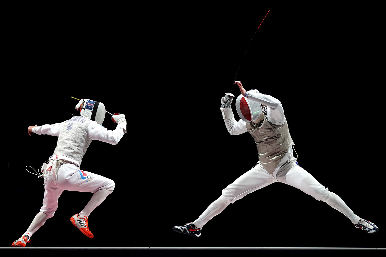 Финал мужских командных соревнований на рапире на Олимпиаде 2020 года в Токио. Фотография: Elsa / Getty Images