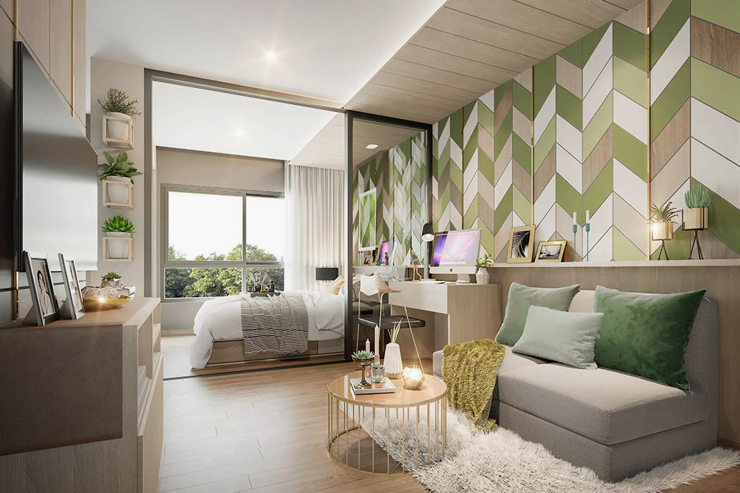 Расположение мебели во всех студиях тоже одинаковое: при входе — серый диван, напротив — тумба с телевизором, дальше — отгороженная спальня, слева — ванная комната и кухня. Источник: grenecondo.com