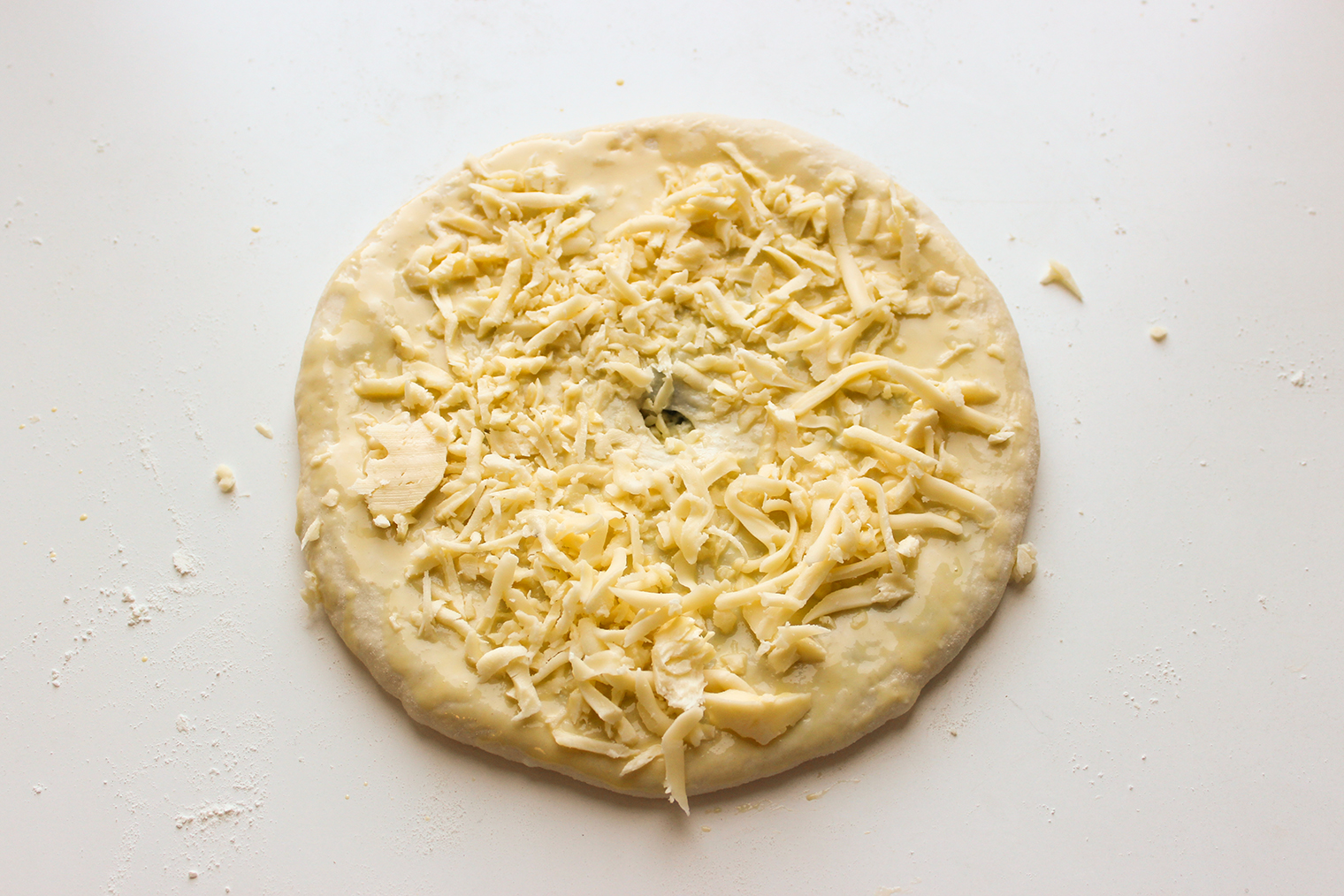 Посыпьте сыром перед запеканием