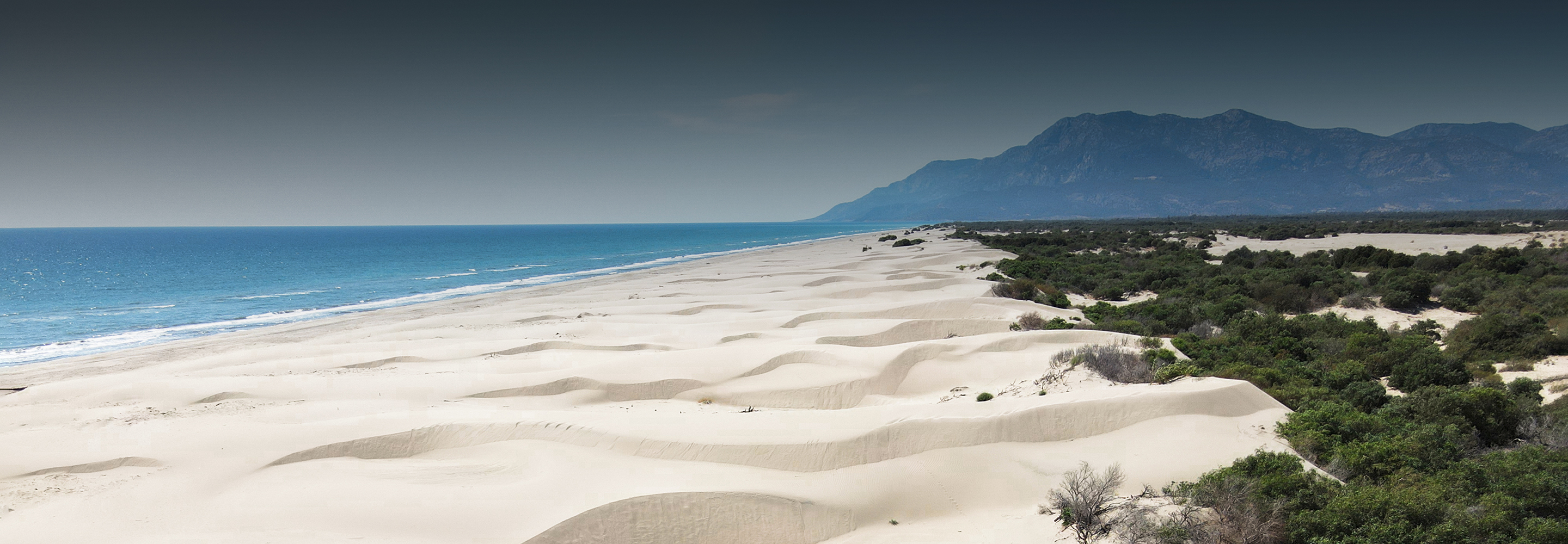 Пляж «Клеопатра» в Аланье: пещеры, крепость, африканский песок