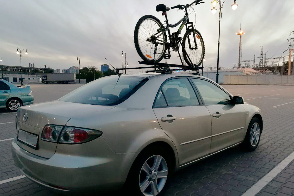 Жена считает, что с велосипедом на крыше машина стала выглядеть проще. А мне нравится