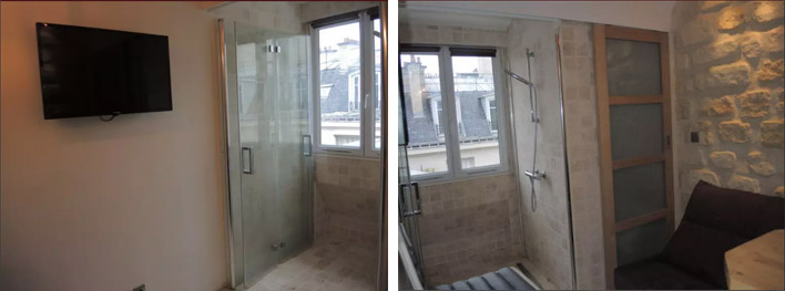 Справа от телевизора — стеклянная дверь в душ. Квартира стоит 600 € в месяц