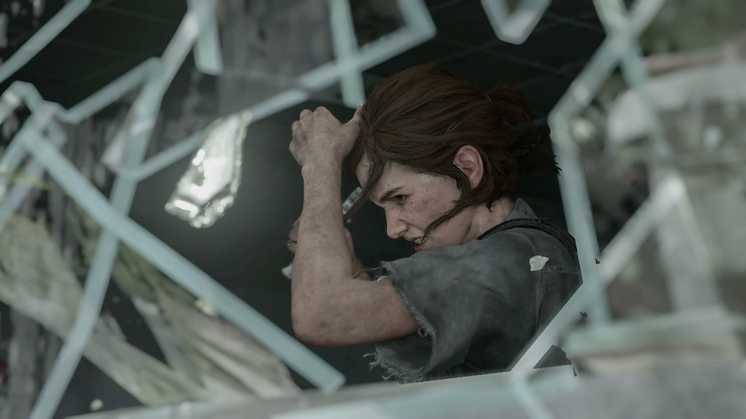 Если разбить окно и быстро войти в фотомод, героя можно обрамить осколками стекла. Кадр: Sony Interactive Entertainment / The Last of Us Part 2