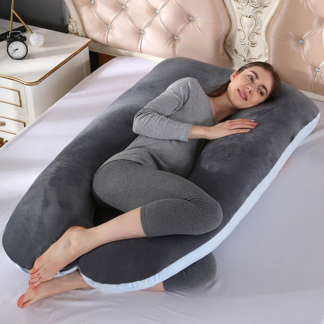 Специальная подушка для беременных поддерживает живот и расслабляет спину. Источник: ozon.ru