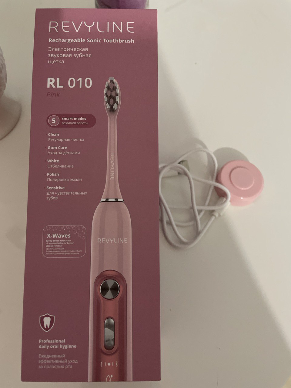 Отзыв об электрической звуковой зубной щетке Revyline RL 010
